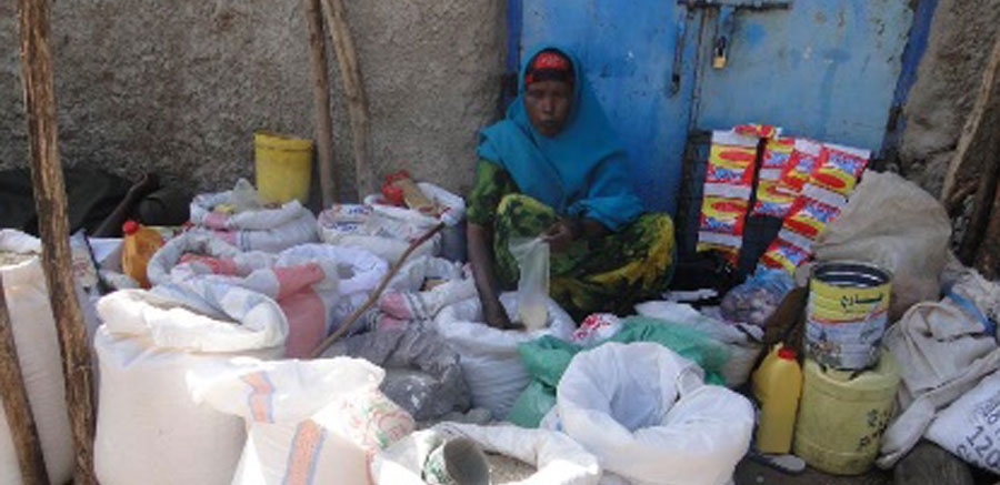 Kenyan Woman at her stall